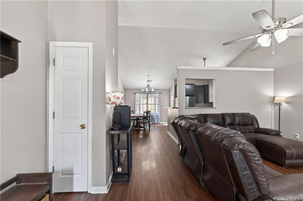 3904 Keystone Ridge Acworth, GA 30101 - Photo 40 of 45 a living room with furniture and a wooden floor
