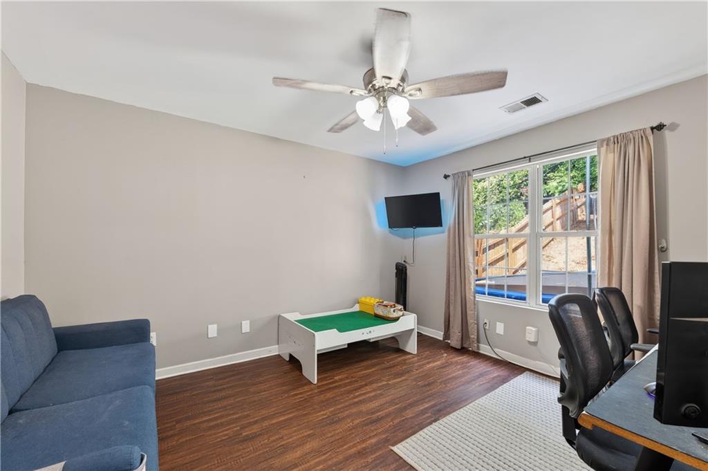 3904 Keystone Ridge Acworth, GA 30101 - Photo 42 of 45 a living room with furniture and a floor to ceiling window