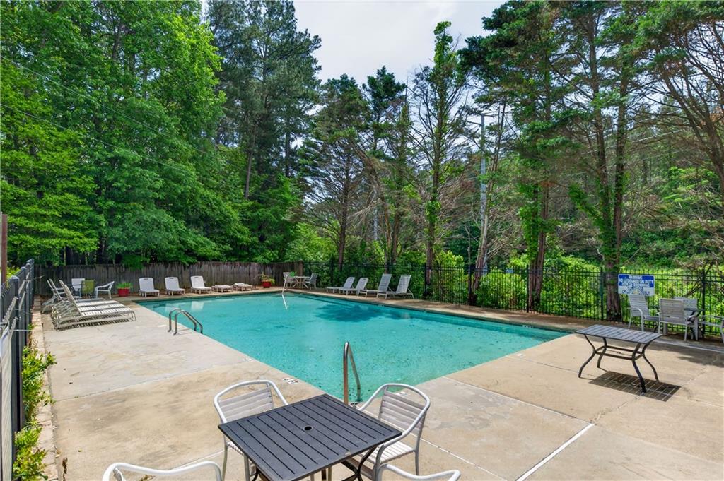 3904 Keystone Ridge Acworth, GA 30101 - Photo 45 of 45 a view of a swimming pool with a patio