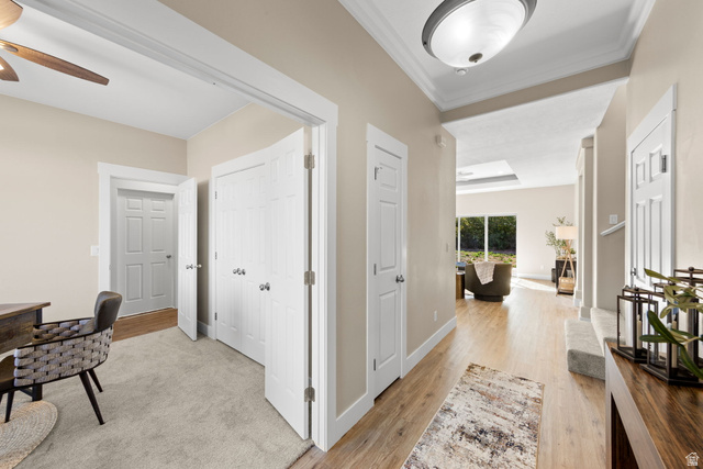 1570 South Rio Virgin Drive Washington, UT 84780 - Photo 8 of 71 Corridor featuring light wood-style floors and crown molding
