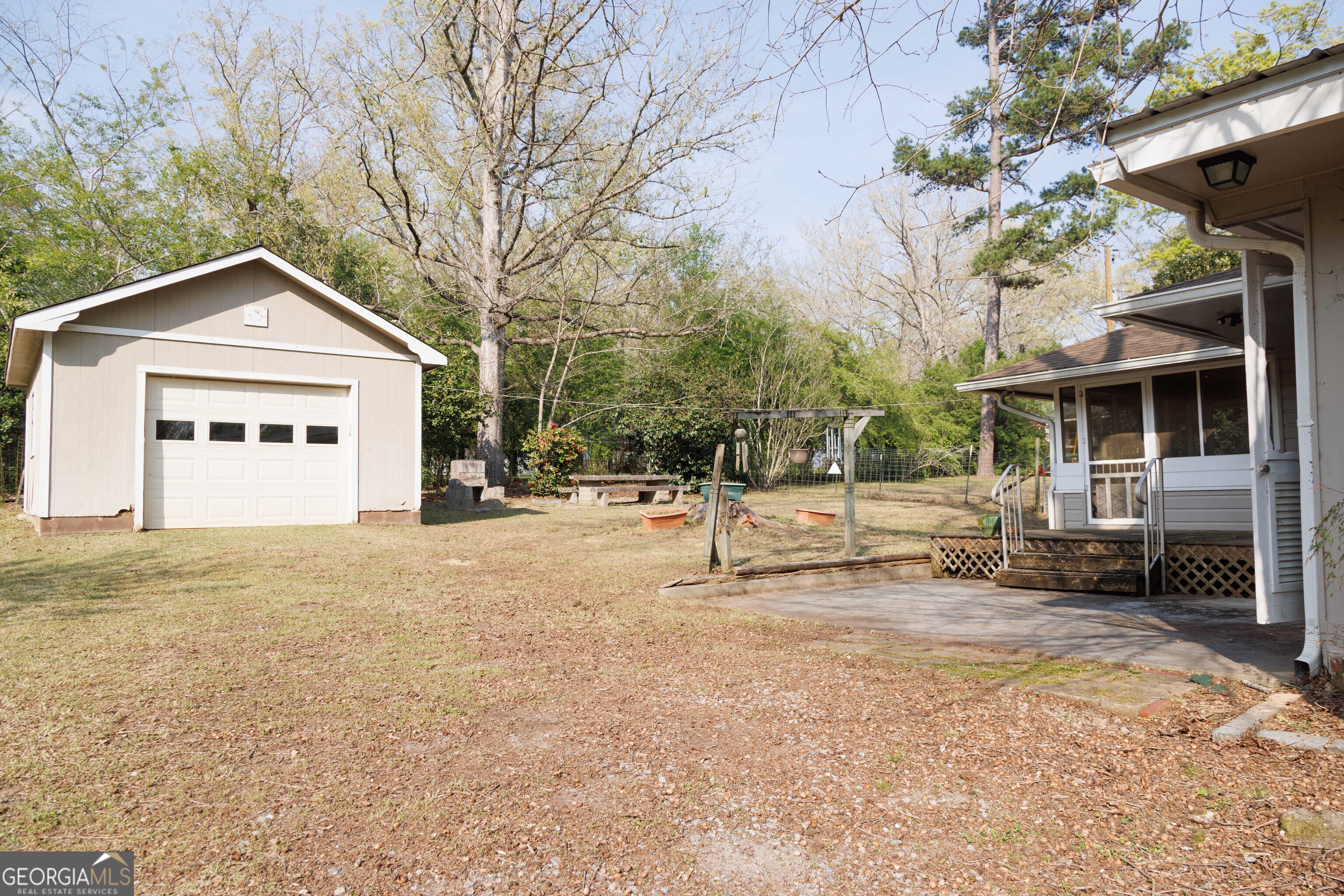 239 Hendry Lane Washington, GA 30673 - Photo 25 of 31 a view of a house with a yard and a tree