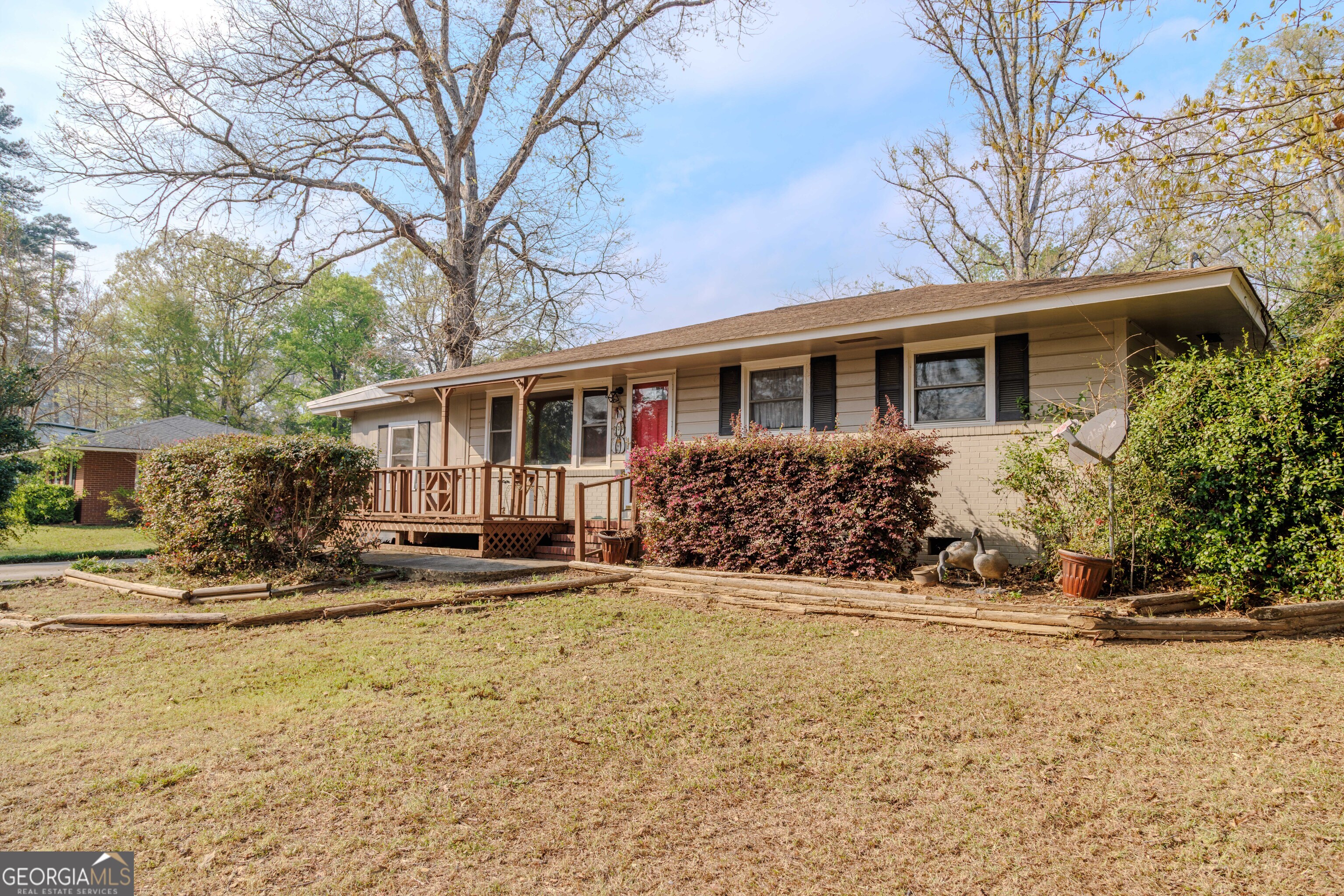 239 Hendry Lane Washington, GA 30673 - Photo 30 of 31 a front view of a house with a yard