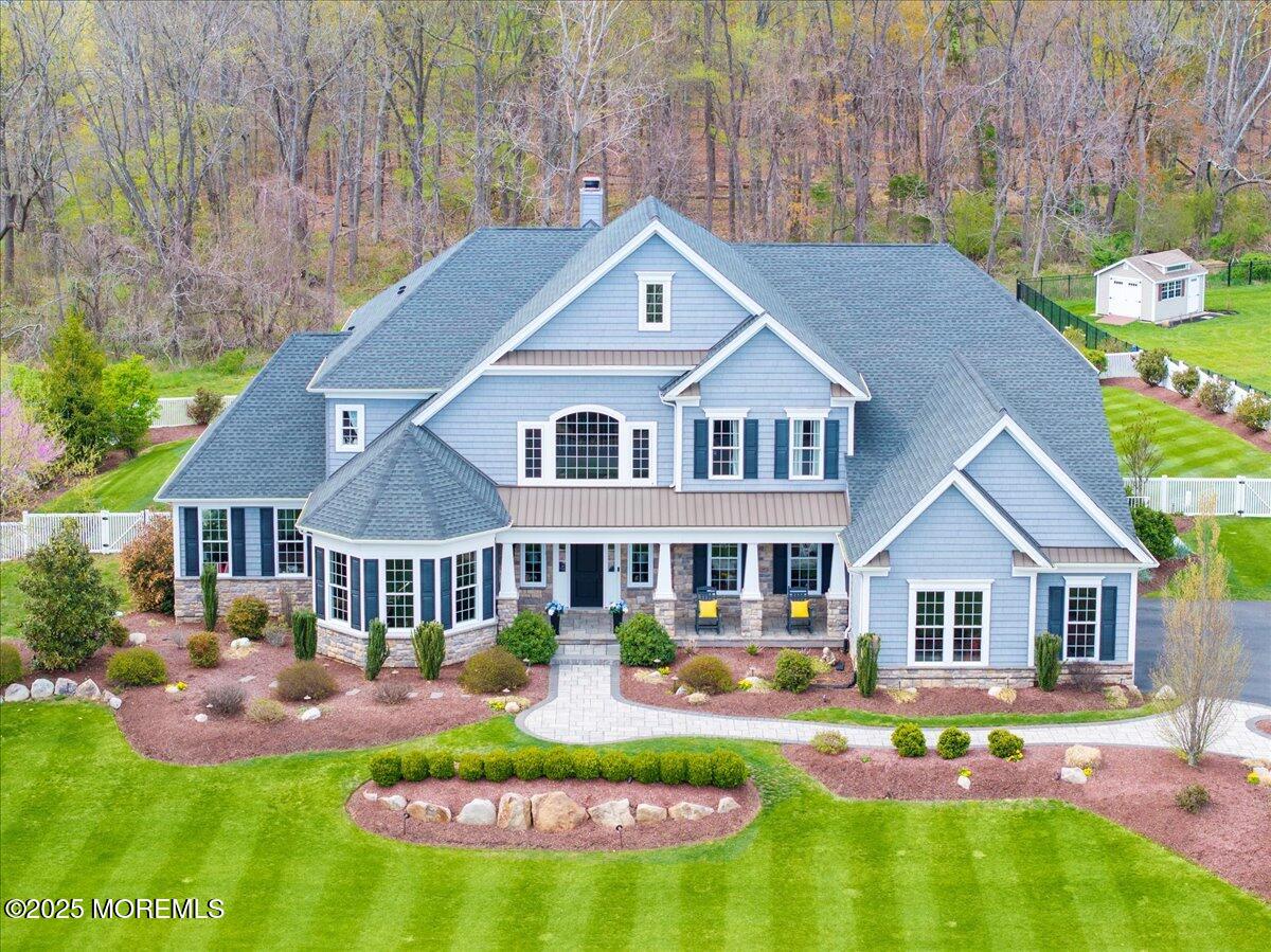 2 Weathervane Circle Cream Ridge, NJ 08514 - Photo 1 of 1 a front view of a house with a yard table and chairs