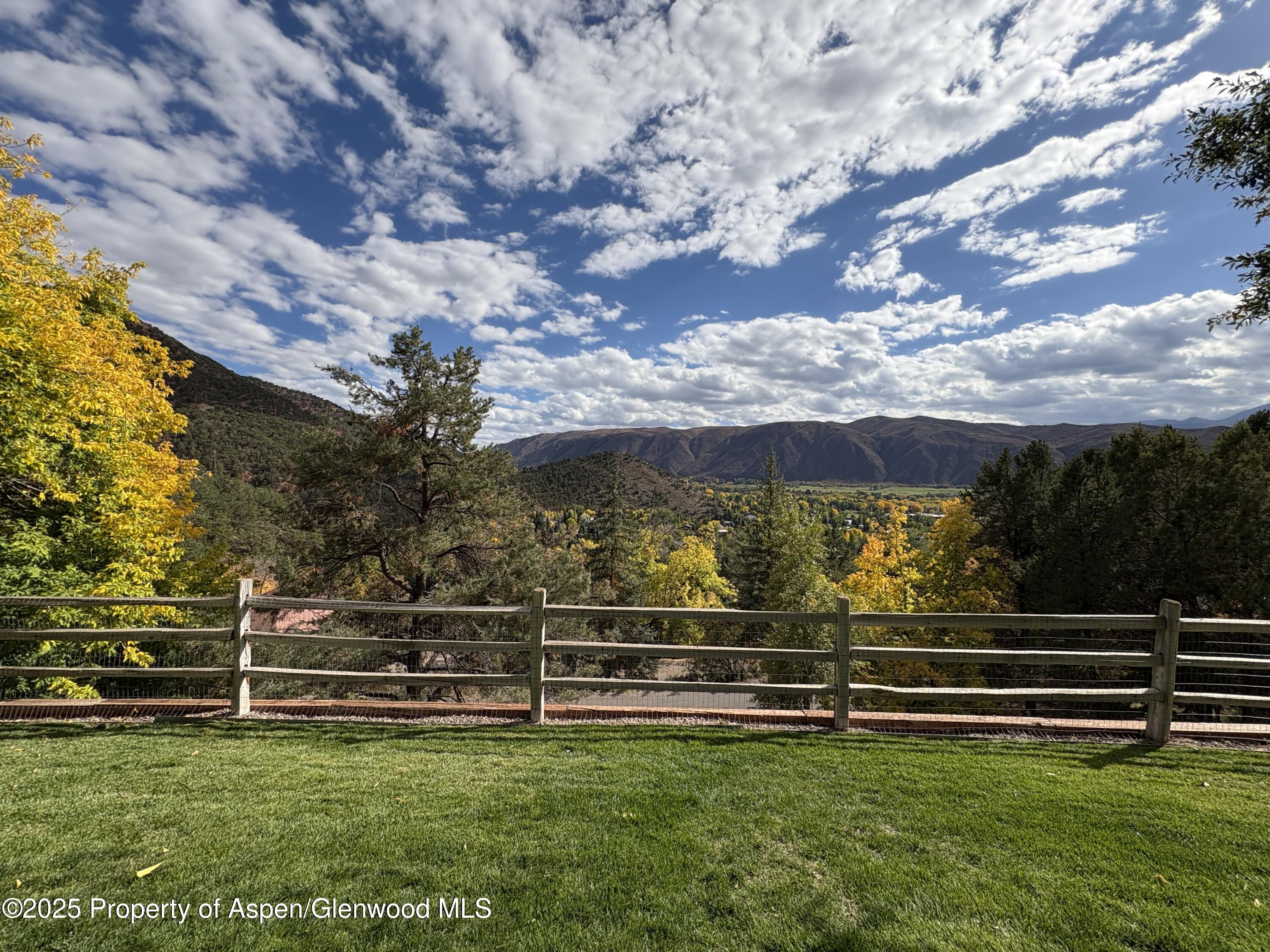 641 Pinon Drive Basalt, CO 81621 - Photo 13 of 17 a view of a golf course with a lake