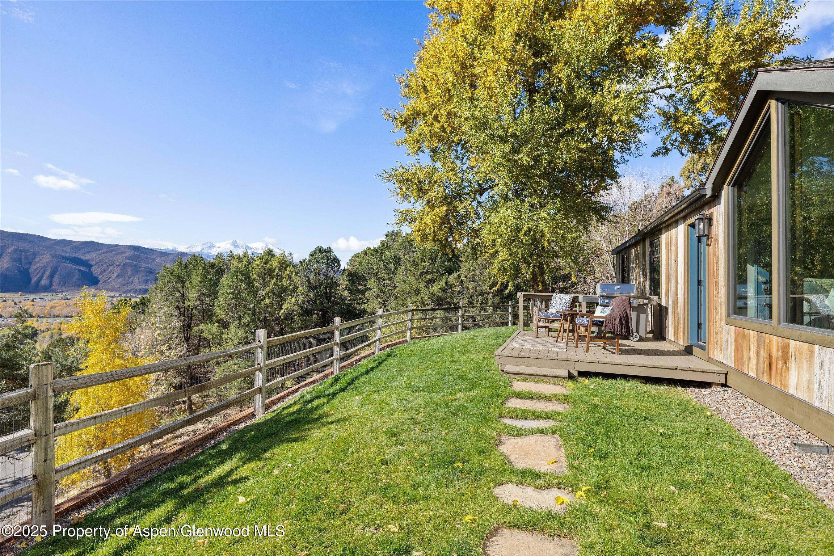 641 Pinon Drive Basalt, CO 81621 - Photo 2 of 17 a view of a house with a yard and sitting area