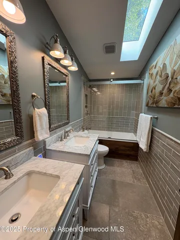 a view of a two chair of the house and wooden floor