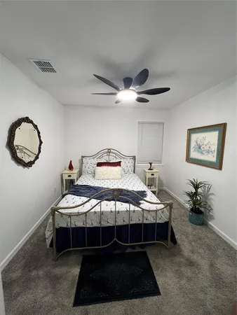 a bathroom with a double vanity sink mirror and double