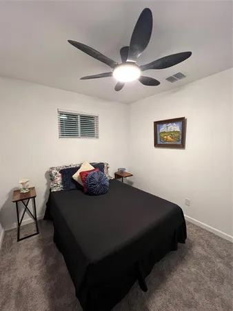 a view of a balcony with two chairs