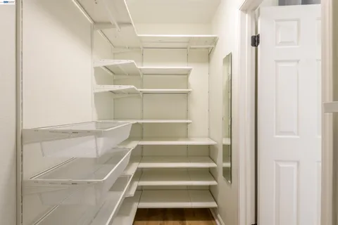 a view of an empty walk in closet
