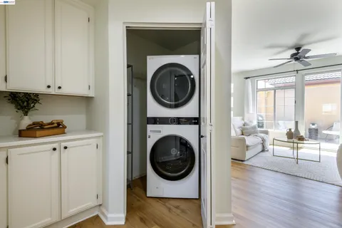 a view of living room washer and dryer
