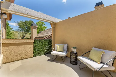 a outdoor living space with furniture and garden view