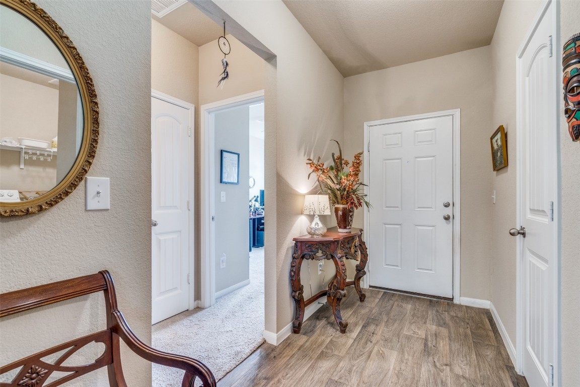 6316 Diamondleaf Bend Austin, TX 78724 - Photo 4 of 25 Entrance foyer featuring light wood finished floors and baseboards