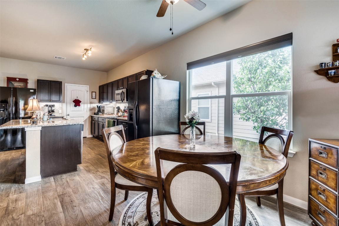 6316 Diamondleaf Bend Austin, TX 78724 - Photo 9 of 25 Dining space with light wood-style floors and ceiling fan
