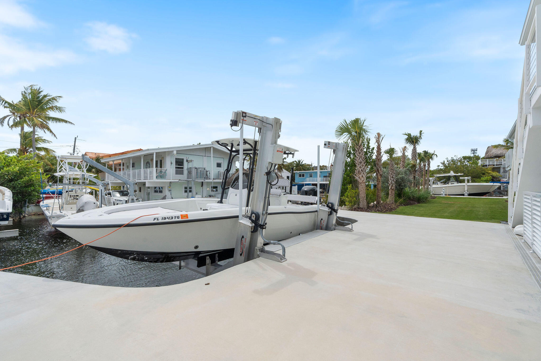 1002 Snapper Lane Key Largo, FL 33037 - Photo 64 of 106 a view of a swimming pool with outdoor space and sitting space