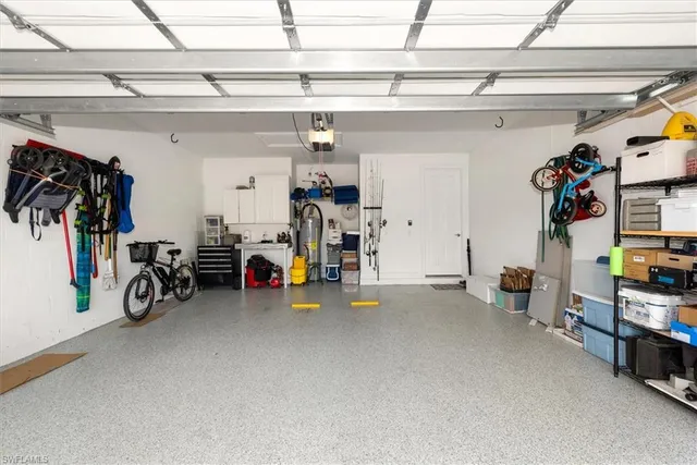 a view of a garage with rack and bicycle