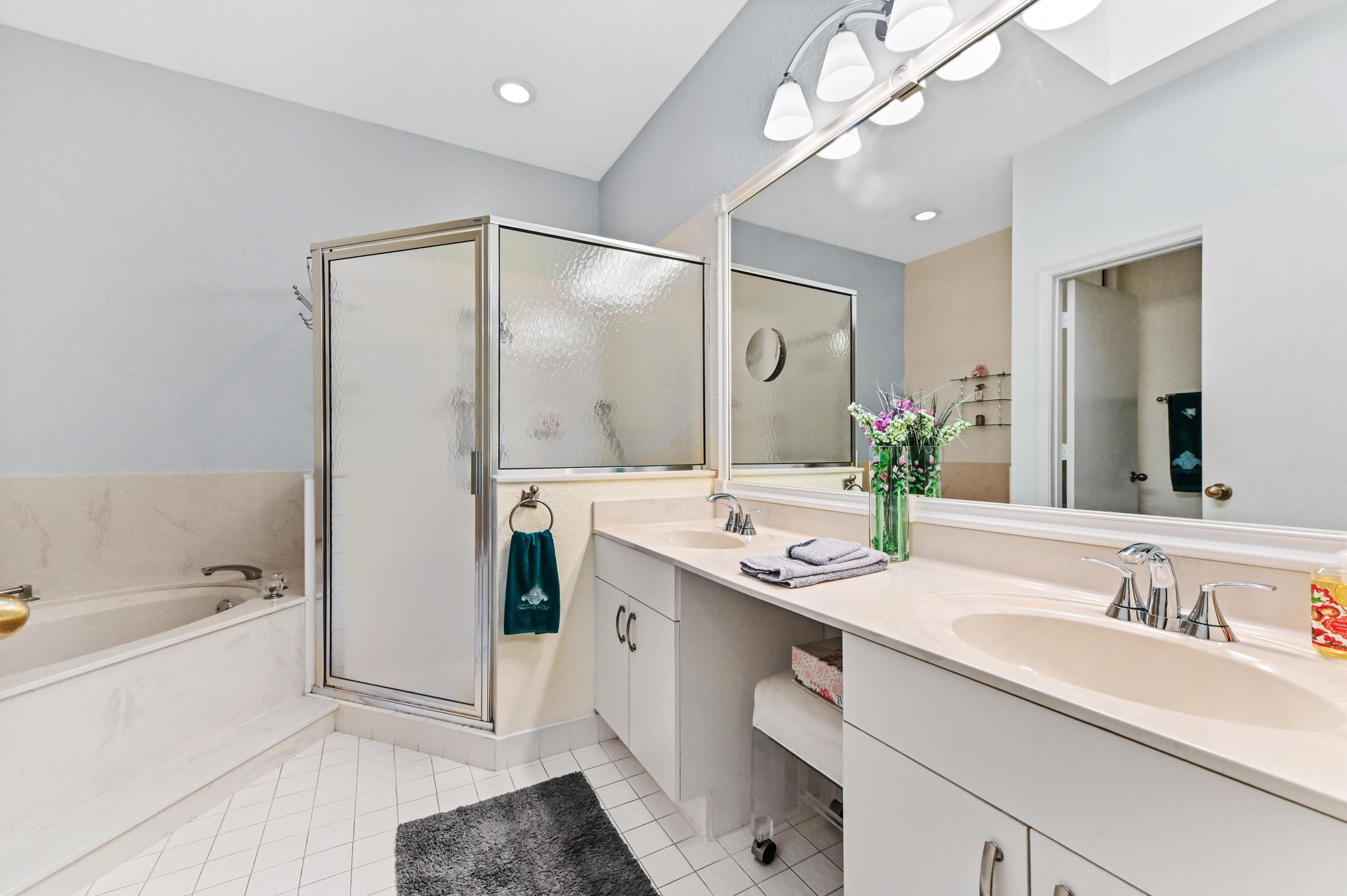 7724 Mansfield Hollow Road Delray Beach, FL 33446 - Photo 24 of 35 Master bath with skylight