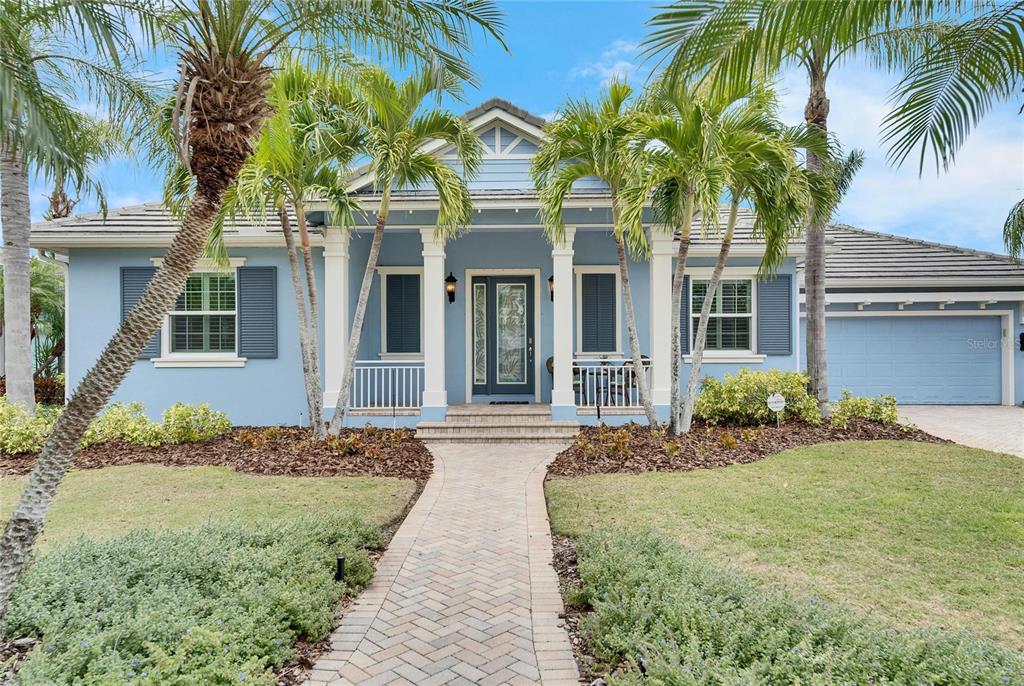 503 Beacon Sound Way Apollo Beach, FL 33572 - Photo 1 of 1 a front view of a house with a garden