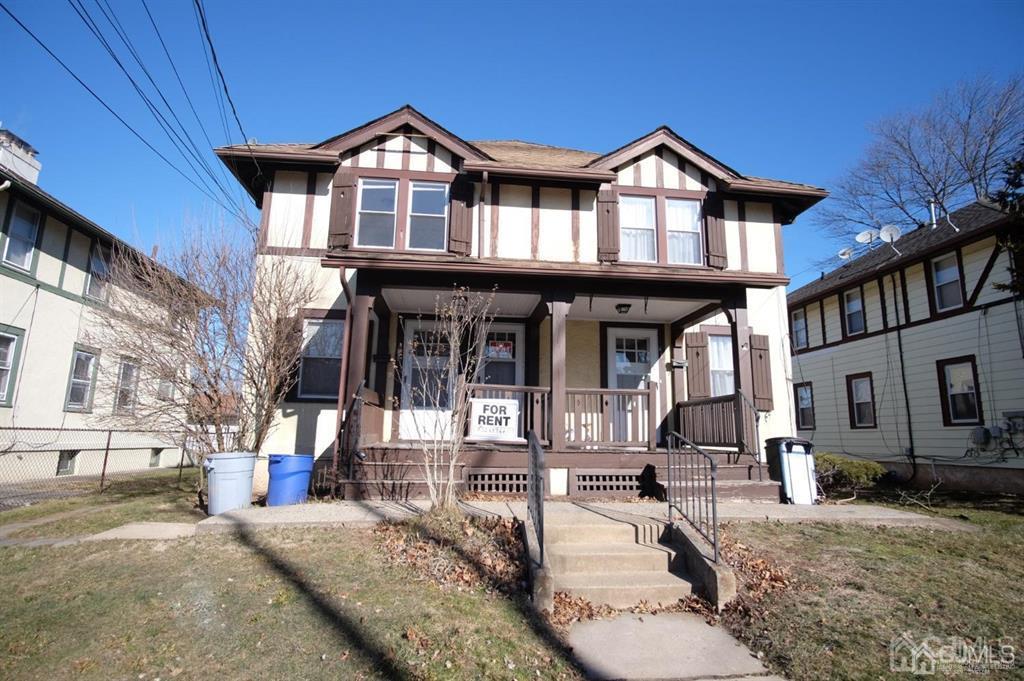 417 Chestnut Street, Unit B Middlesex, NJ 08846 - Photo 1 of 12 a front view of a house with a porch