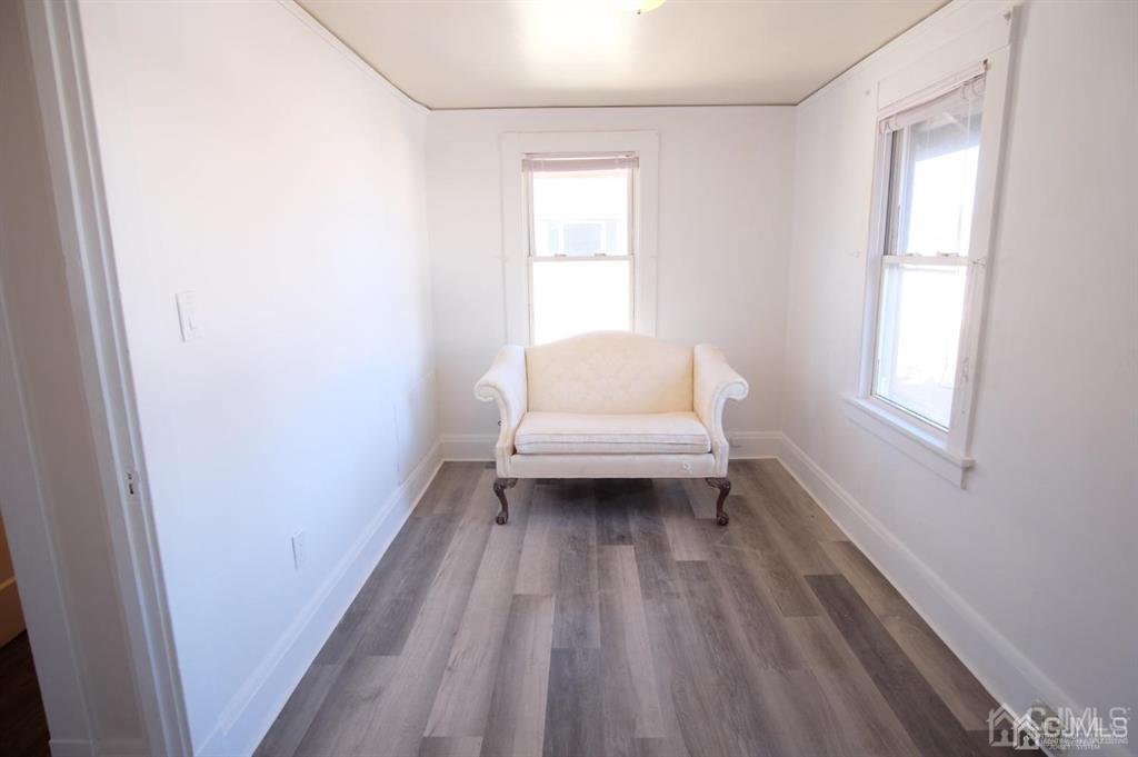 417 Chestnut Street, Unit B Middlesex, NJ 08846 - Photo 8 of 12 a bathroom with a sink toilet and window