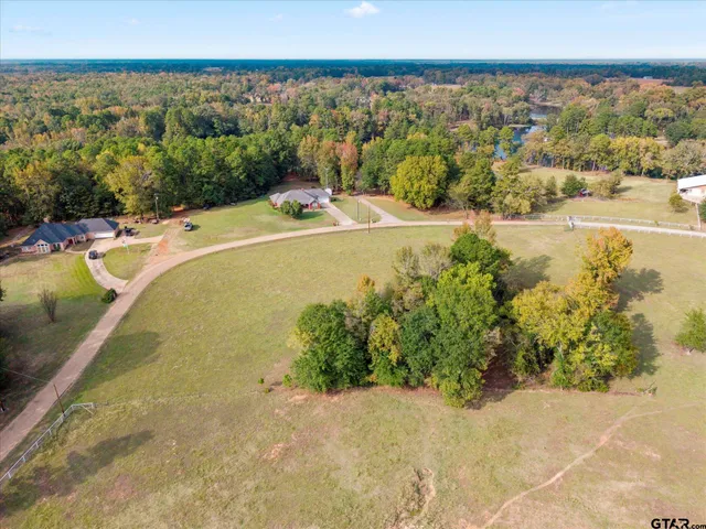 a view of a swimming pool and an outdoor space