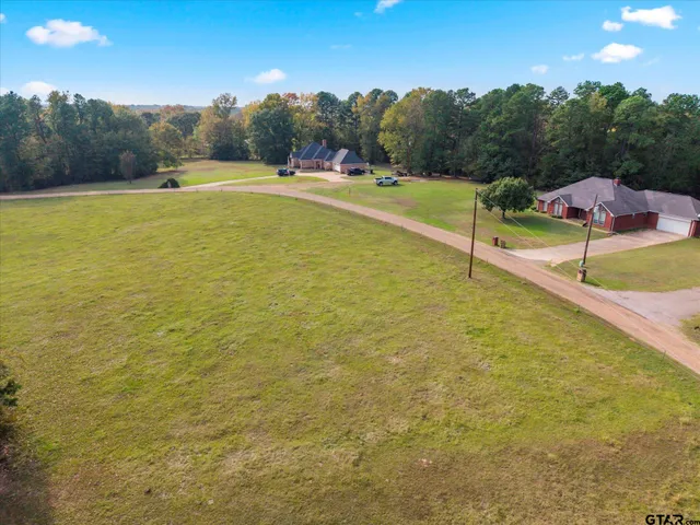 a view of a yard with an outdoor space