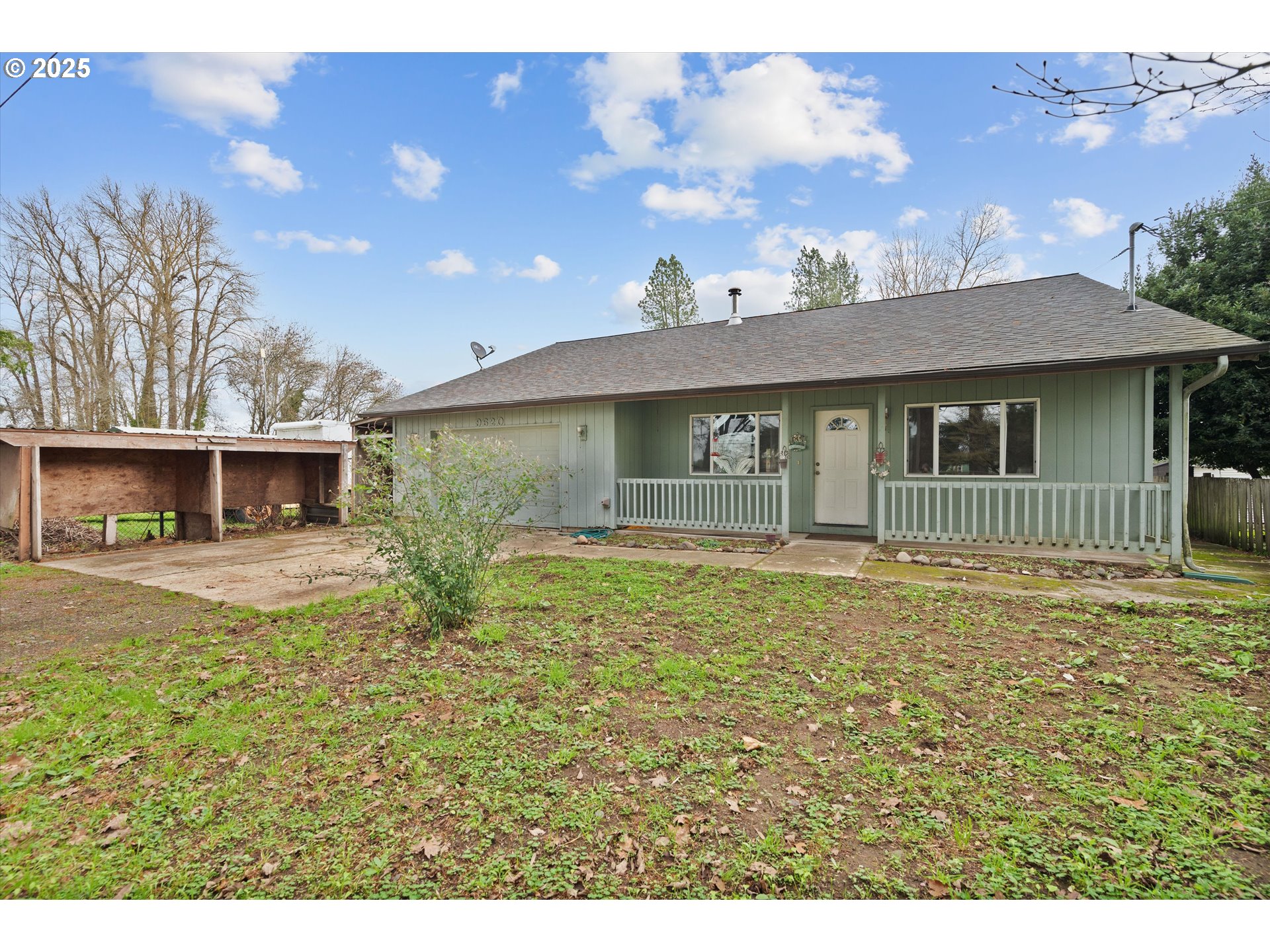 9620 Wells Landing Road Independence, OR 97351 - Photo 2 of 22 a view of a house with a garden and yard