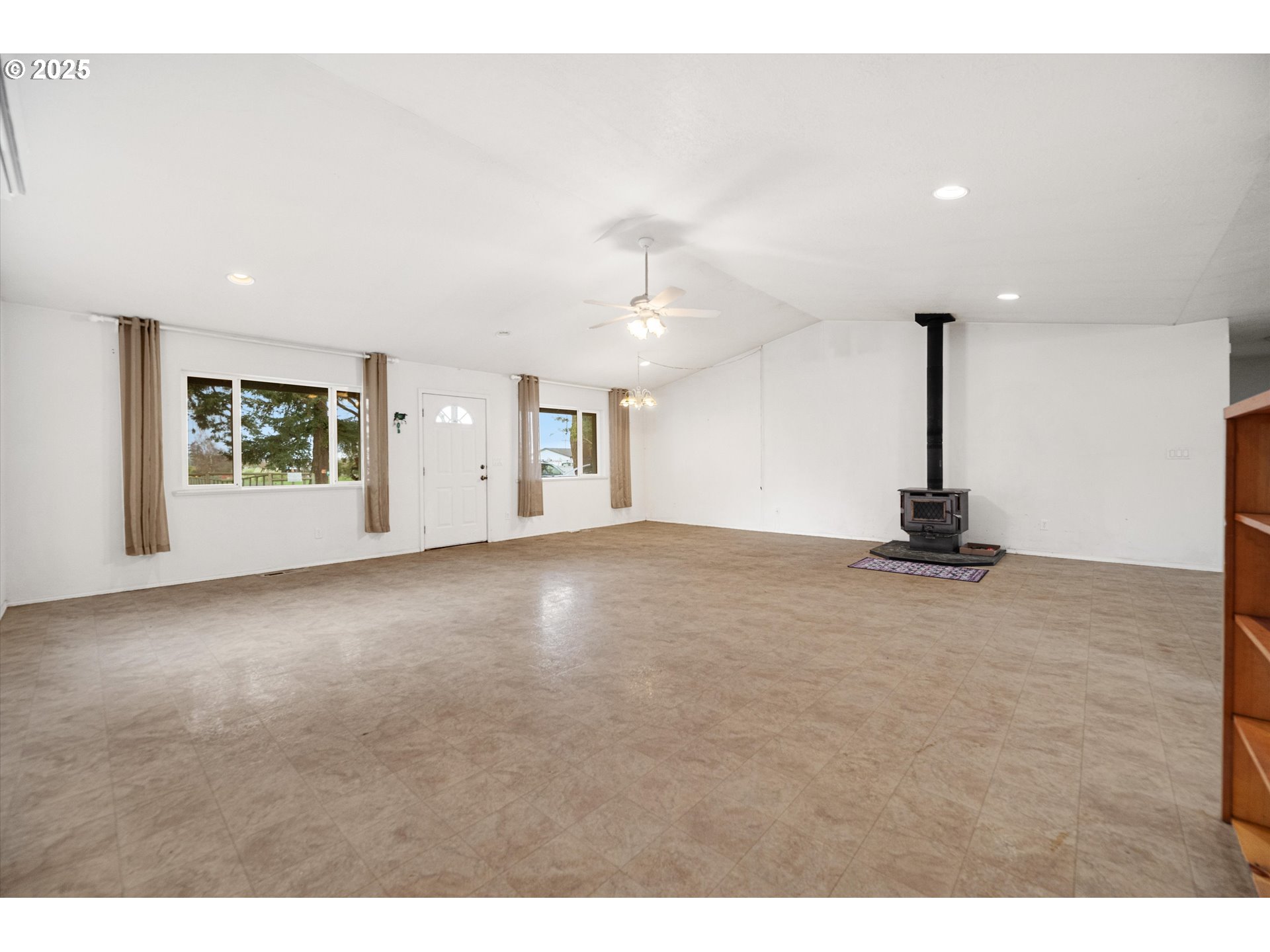 9620 Wells Landing Road Independence, OR 97351 - Photo 5 of 22 a view of a livingroom with a staircase