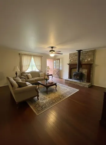 a garden with an outdoor seating