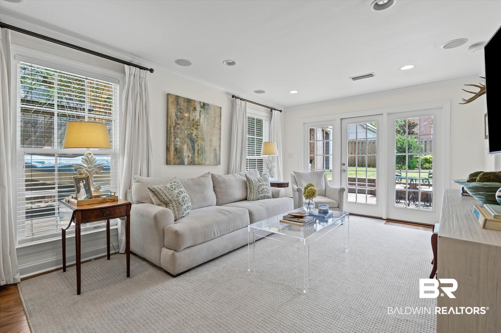 77 North Hathaway Road Mobile, AL 36608 - Photo 13 of 33 Living area featuring ornamental molding, recessed lighting, and wood finished floors