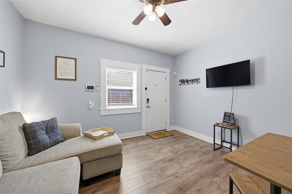 2320 Mistletoe Street Waco, TX 76706 - Photo 14 of 23 a living room with furniture and a flat screen tv