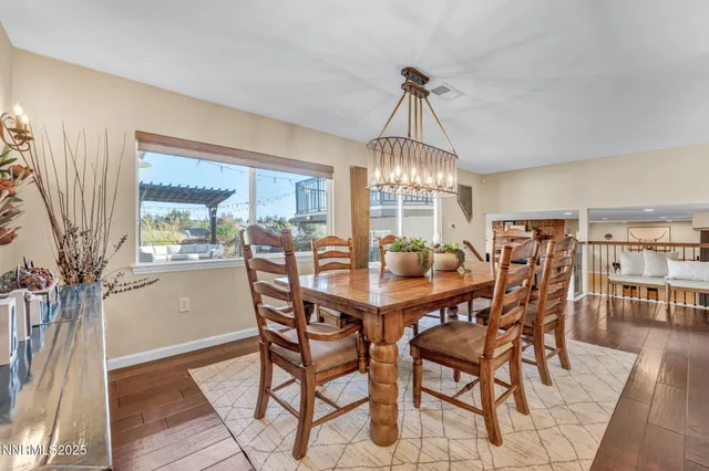 a bedroom with a bed couch and window