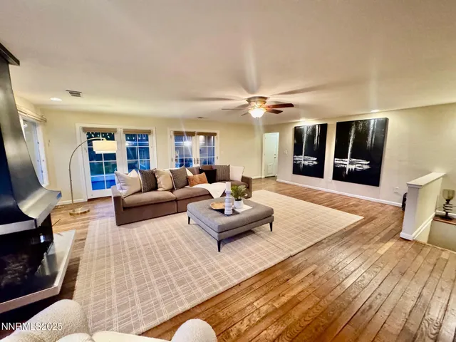 a utility room with stainless steel appliances granite countertop a sink and washer