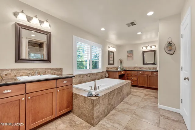 a view of a chairs and table in the patio