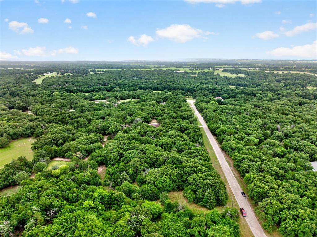 Tbd Woodland Estates Road Terrell, TX 75160 - Photo 15 of 22 an aerial view of residential houses with outdoor space and trees