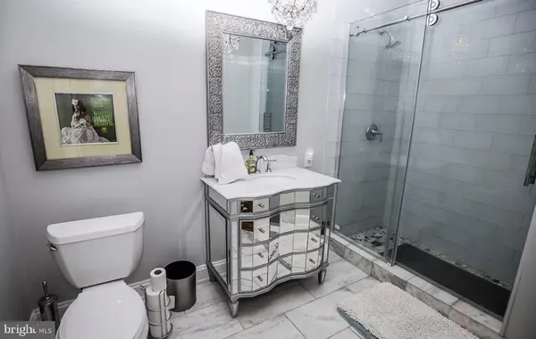 a bedroom with bed and a window