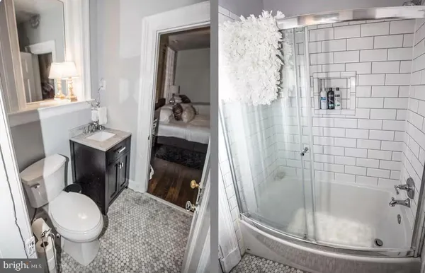 a bedroom with a bed and a couch