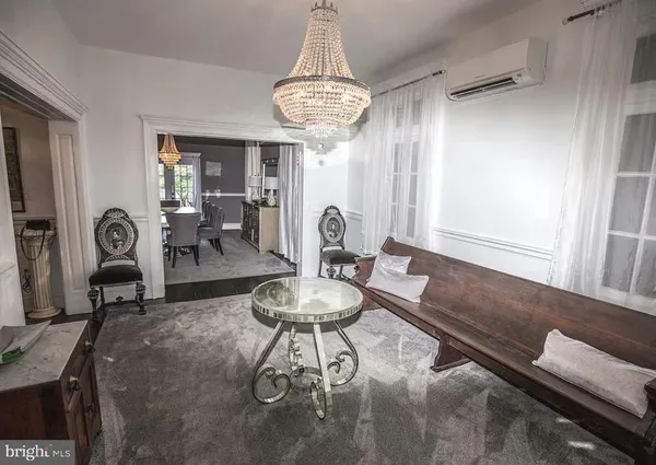 a view of a dining room with furniture