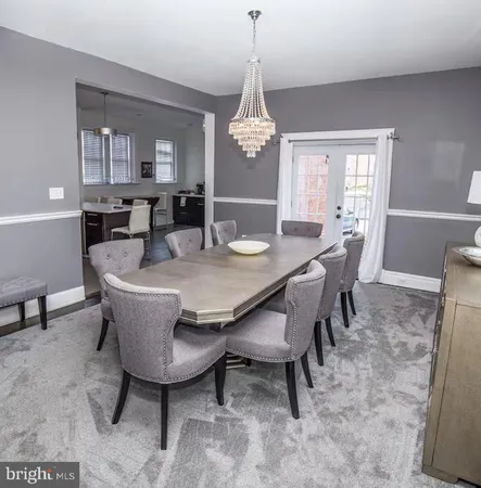 a kitchen with stainless steel appliances a stove refrigerator sink and microwave