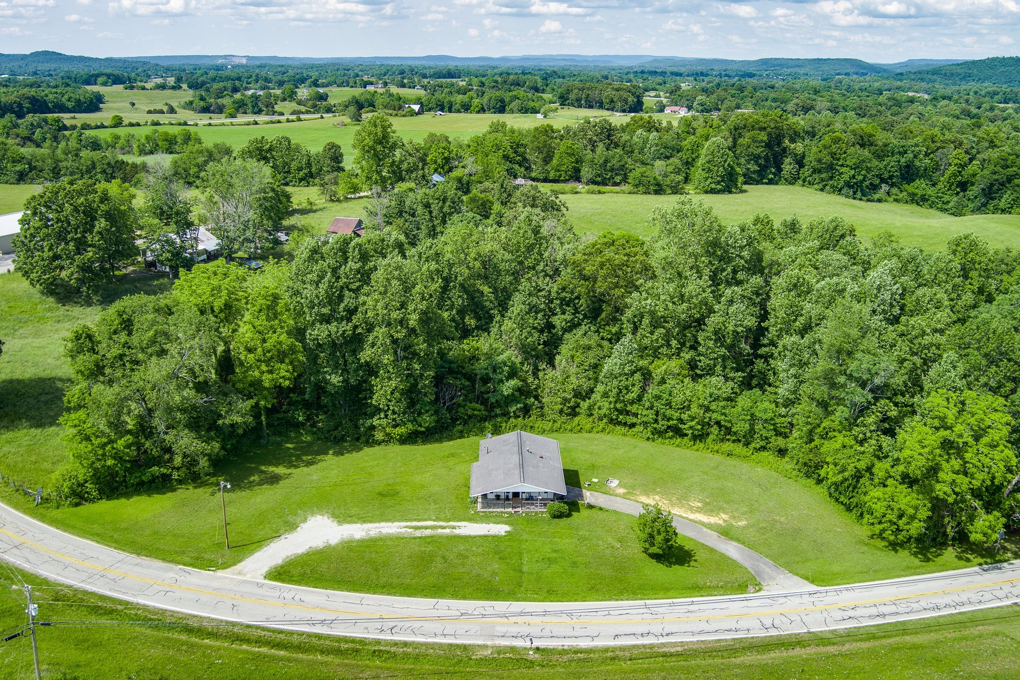 1121 East Gooseneck Road Doyle, TN 38559 - Photo 13 of 20 a view of a swimming pool with a yard