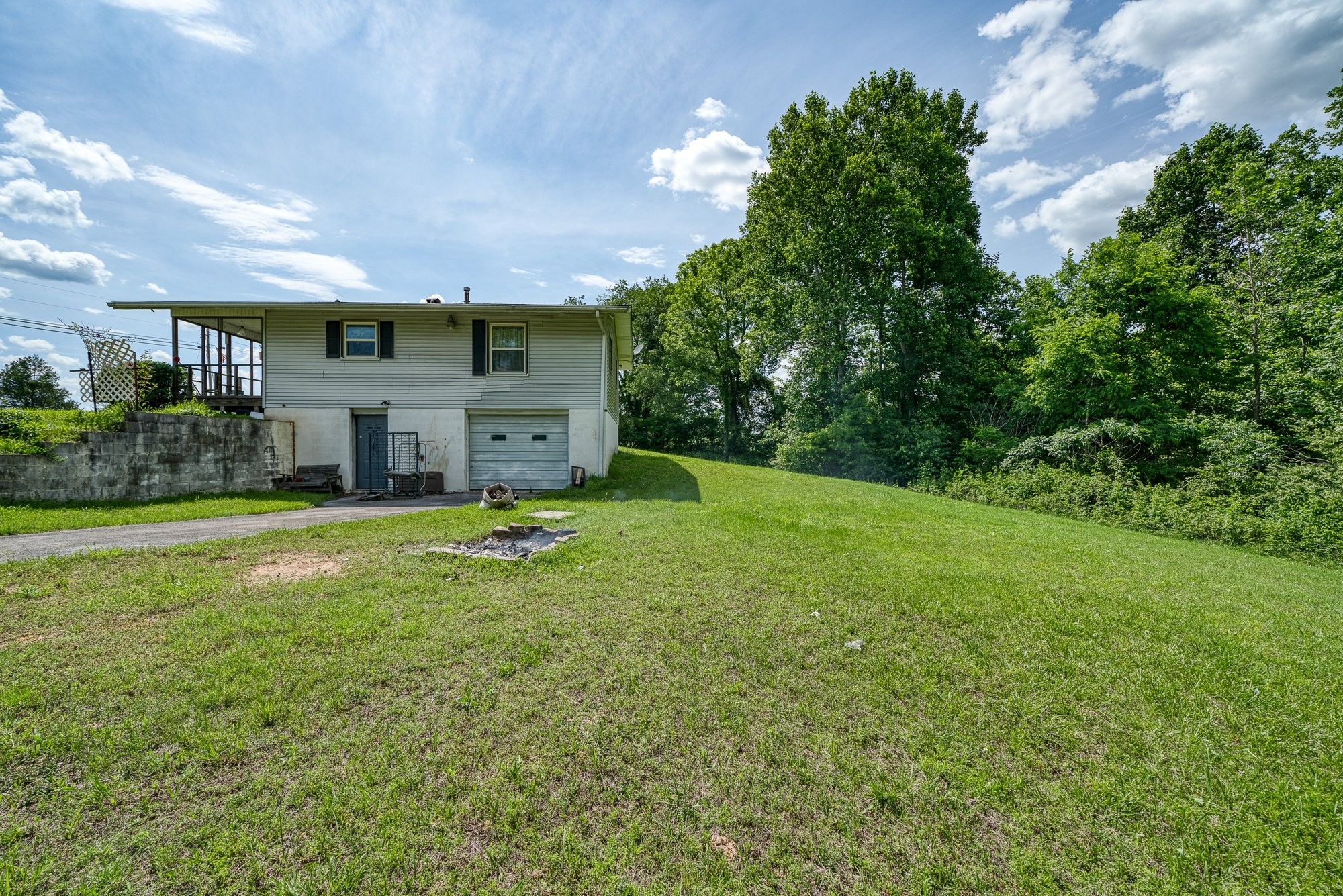 1121 East Gooseneck Road Doyle, TN 38559 - Photo 4 of 20 a view of a house with a backyard