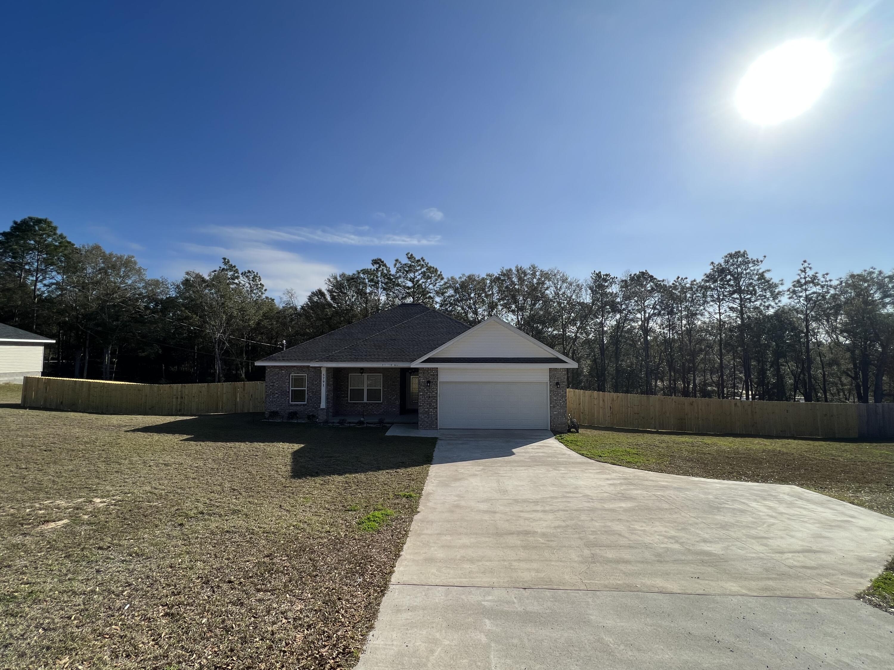 5791 Kellie Drive Crestview, FL 32539 - Photo 1 of 8 a view of a house with a yard