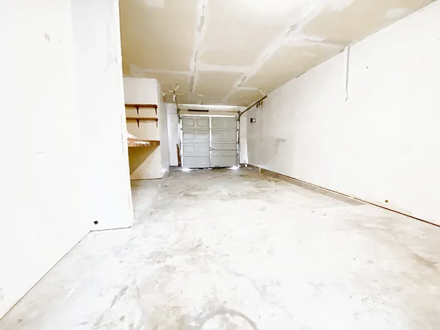 a view of a livingroom with wooden floor