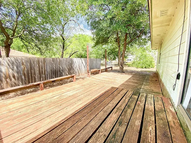 a backyard of a house with lots of green space