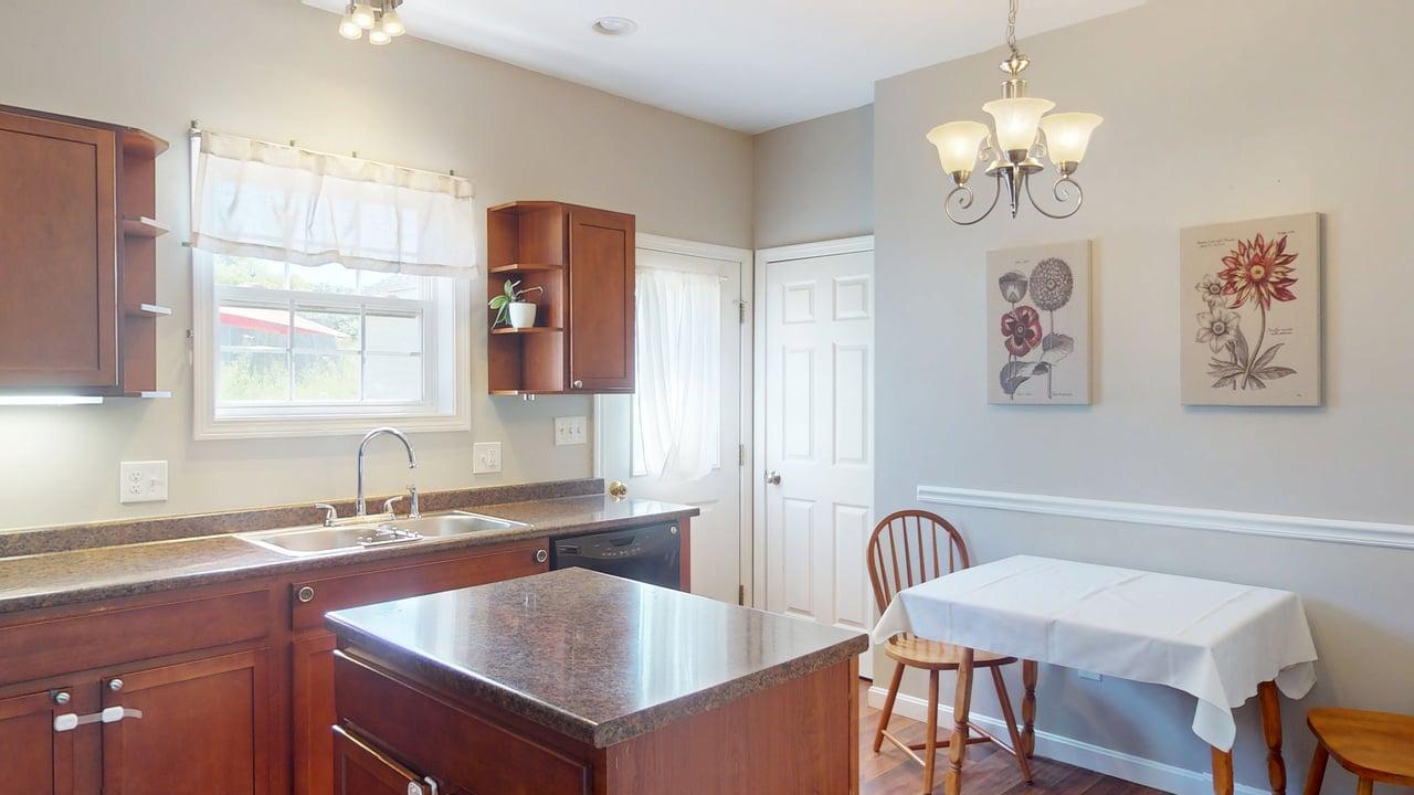 31 Whisper Drive Bangor, ME 04401 - Photo 10 of 38 Kitchen and sitting area