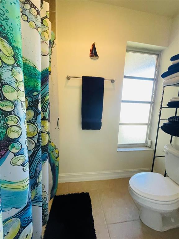 3405 Indiana Road Rotonda West, FL 33947 - Photo 11 of 17 a bathroom with a toilet and a shower