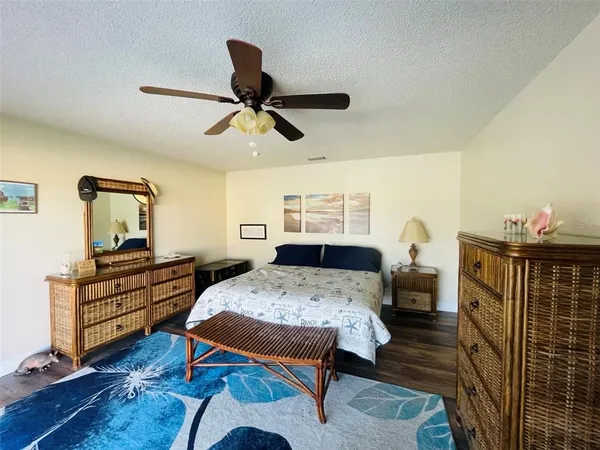 a bed room with furniture and a window