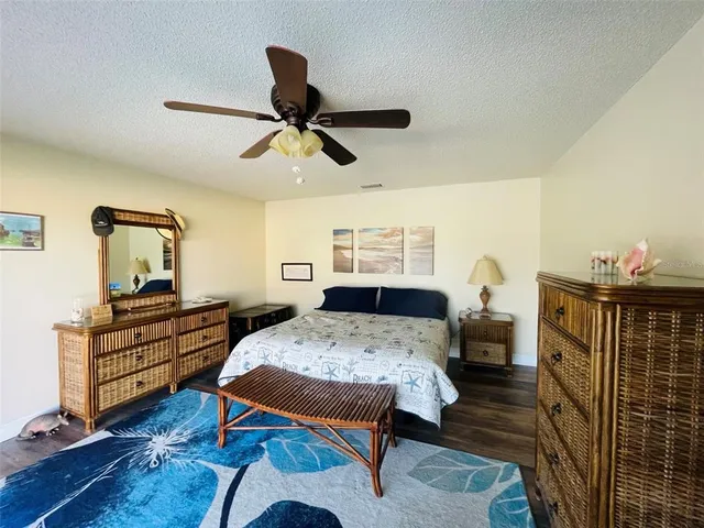 a bed room with furniture and a window