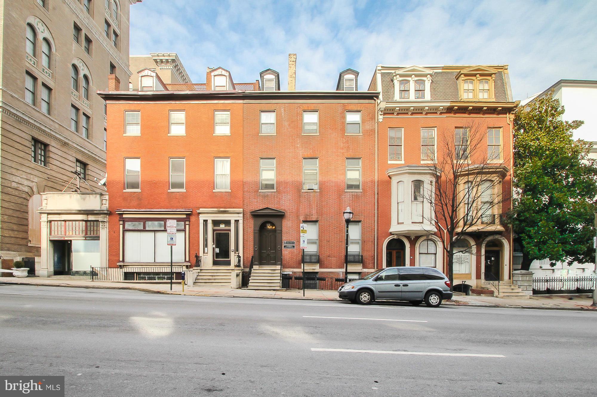 18 West Franklin Street Baltimore, MD 21201 - Photo 2 of 30 a car parked in front of a building