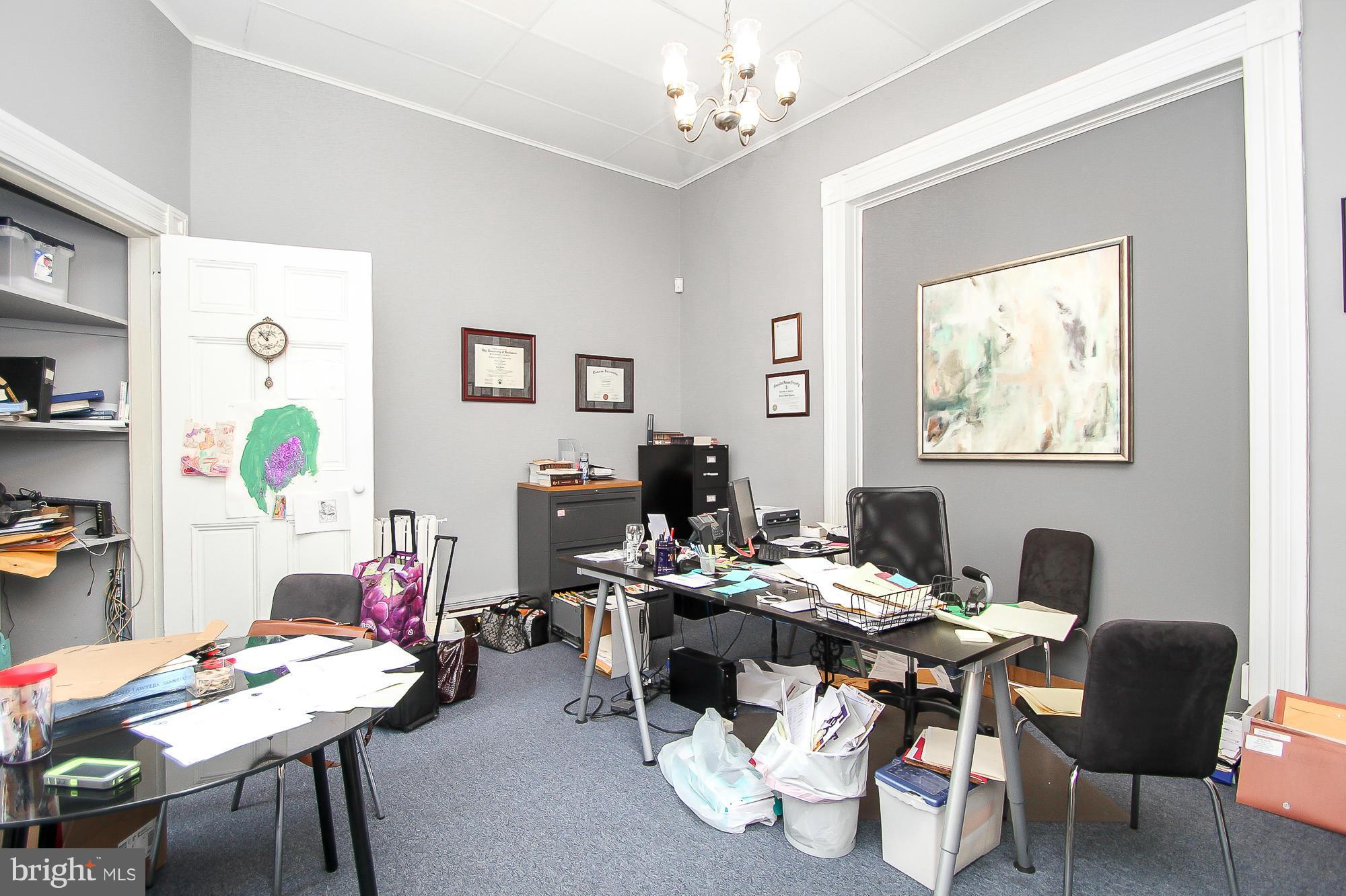 18 West Franklin Street Baltimore, MD 21201 - Photo 11 of 30 a work room with furniture and window