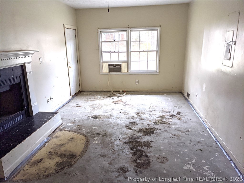 661 Azalea Drive Spring Lake, NC 28390 - Photo 4 of 7 a view of an empty room and window